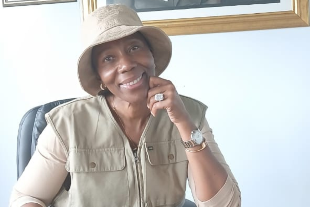 Getting inspiration to grow the family legacy – the Chief Executive Officer of PMM Agri, Dr Patience Mlengana in her boardroom with the painting of the parents hanging on the wall.

